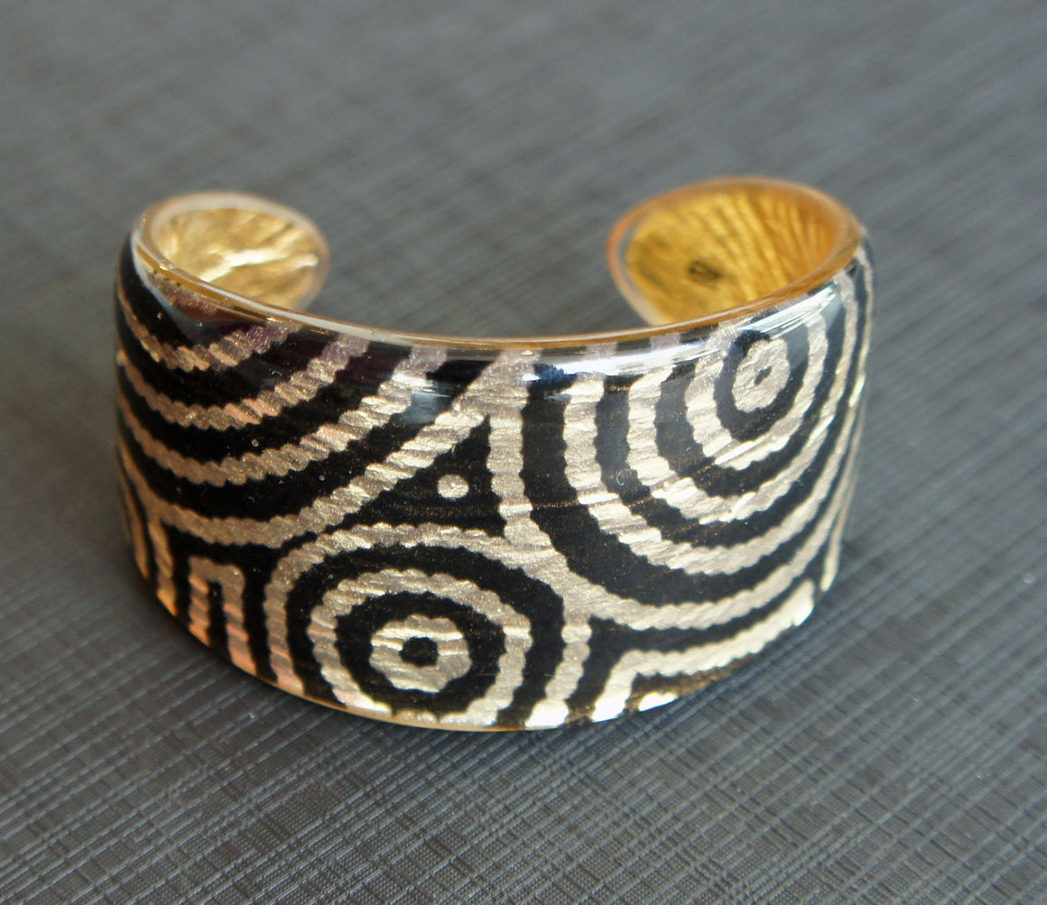 Medium gold swirl cuff